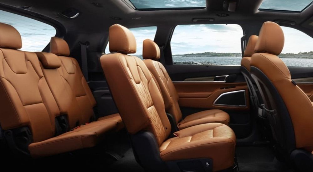 Three rows of leather-upholstered seating in a 2025 Kia Telluride SX Prestige.