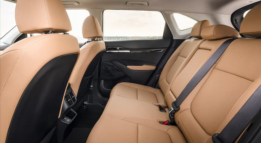 The tan rear interior in a 2025 Kia Seltos for sale.