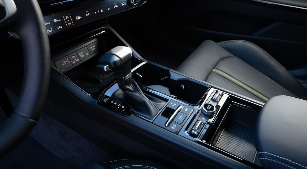 Shifter and dashboard controls inside a 2025 Kia K5.