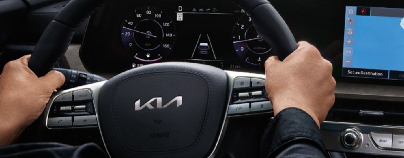 Black steering wheel and interior of a 2025 Kia Telluride